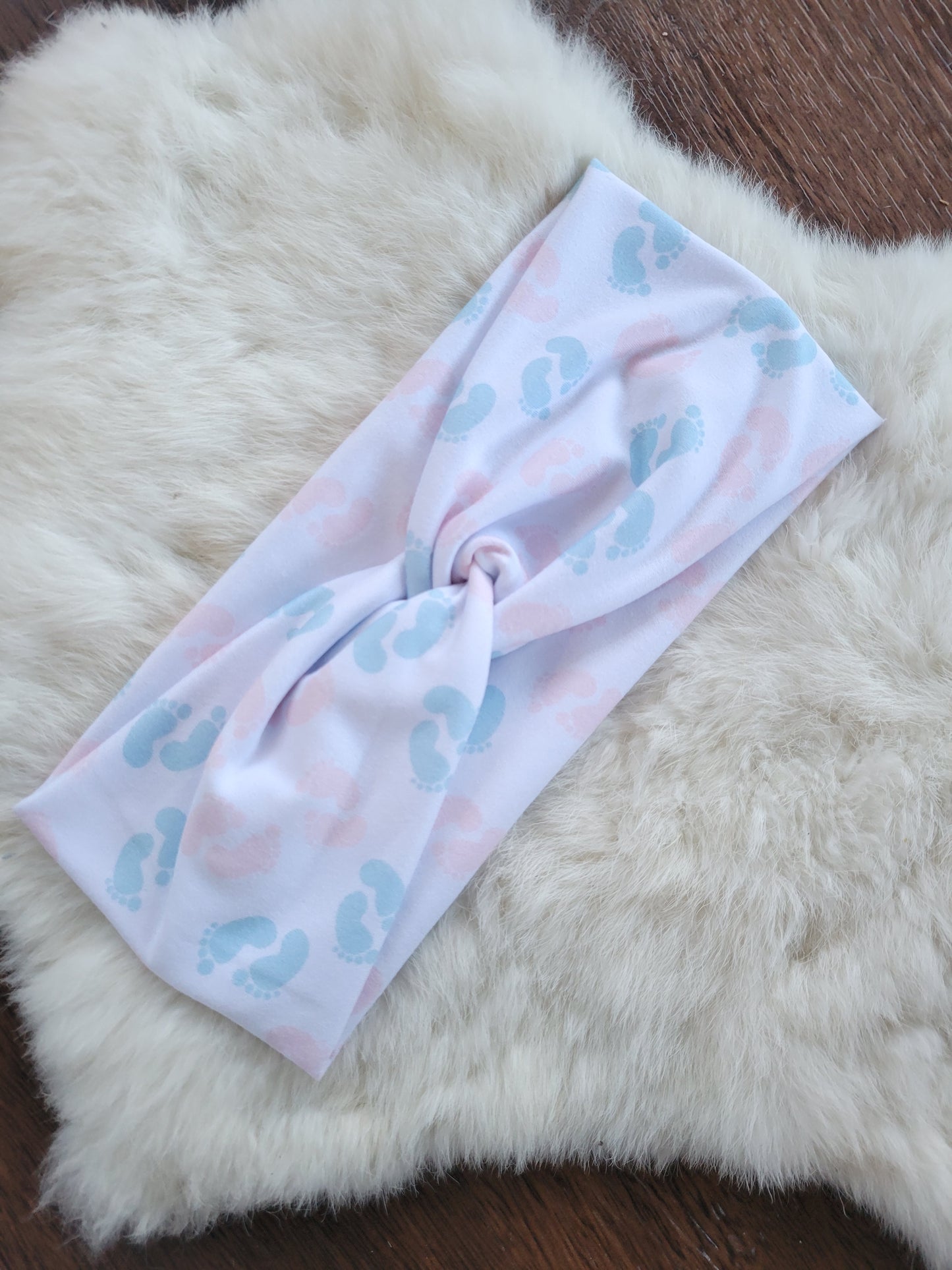 Light pink and blue baby feet