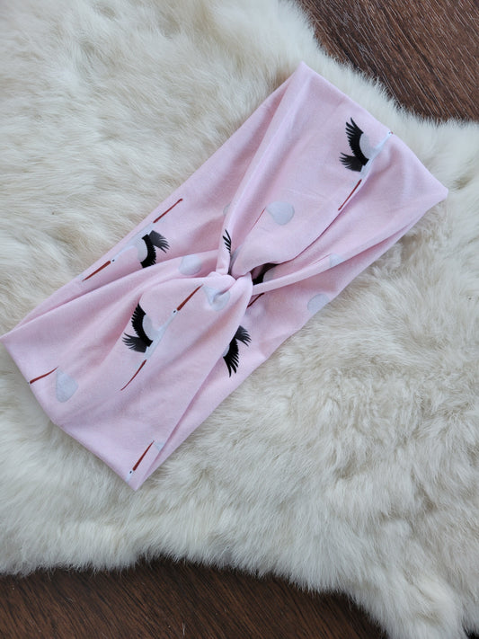 Pink stork baby