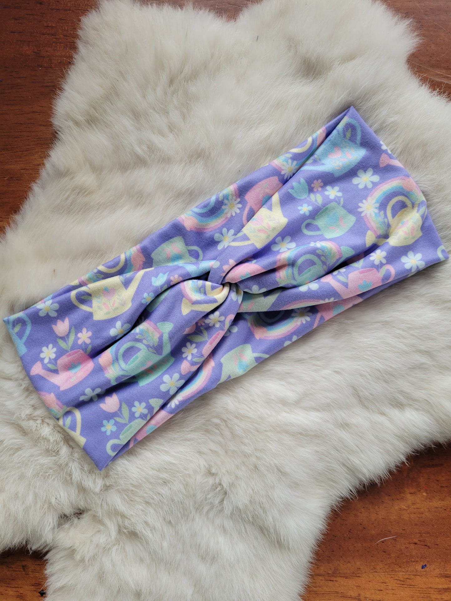 Purple rainbows watering cans