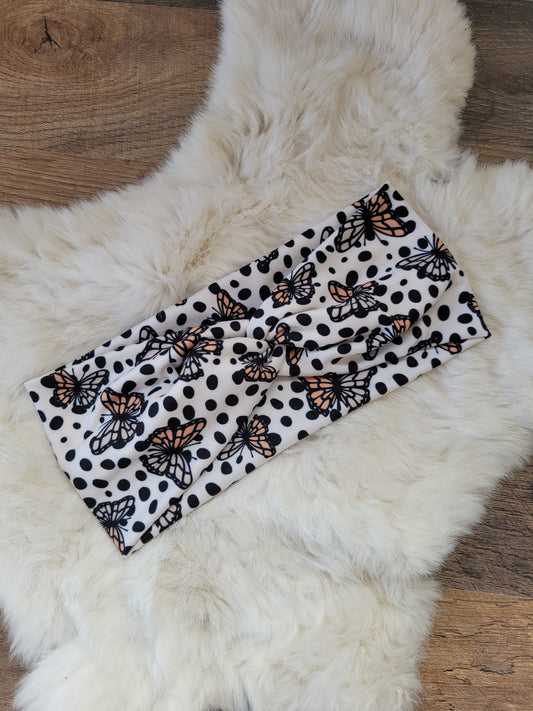 Black polka dot orange butterflies