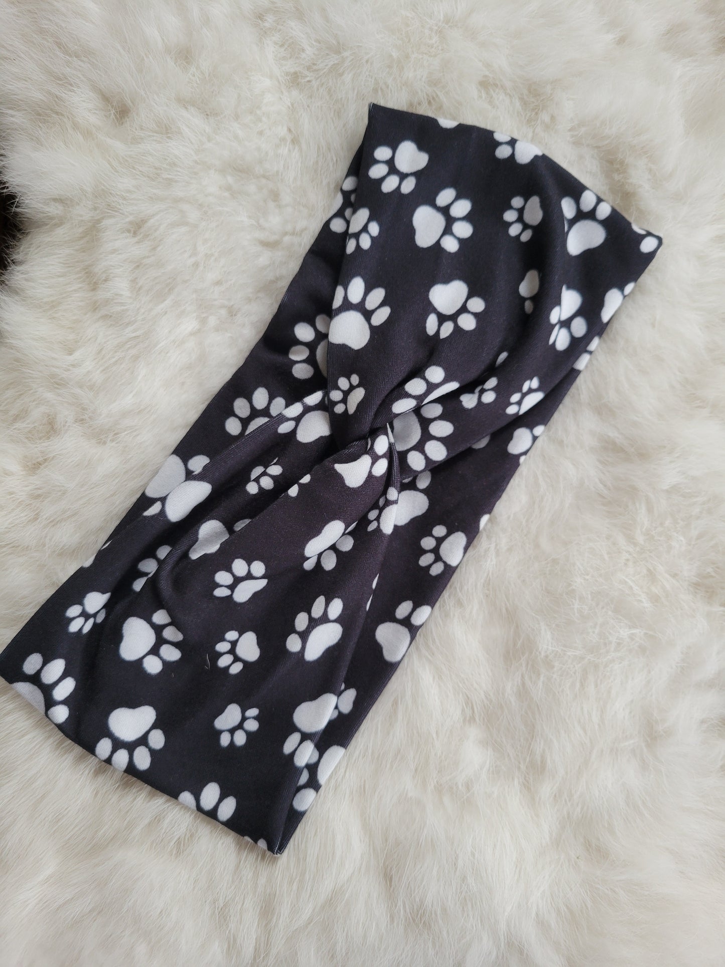 White and black paw prints