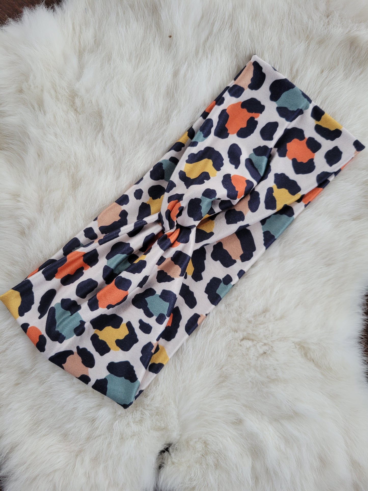 Green, orange, yellow spotted leopard