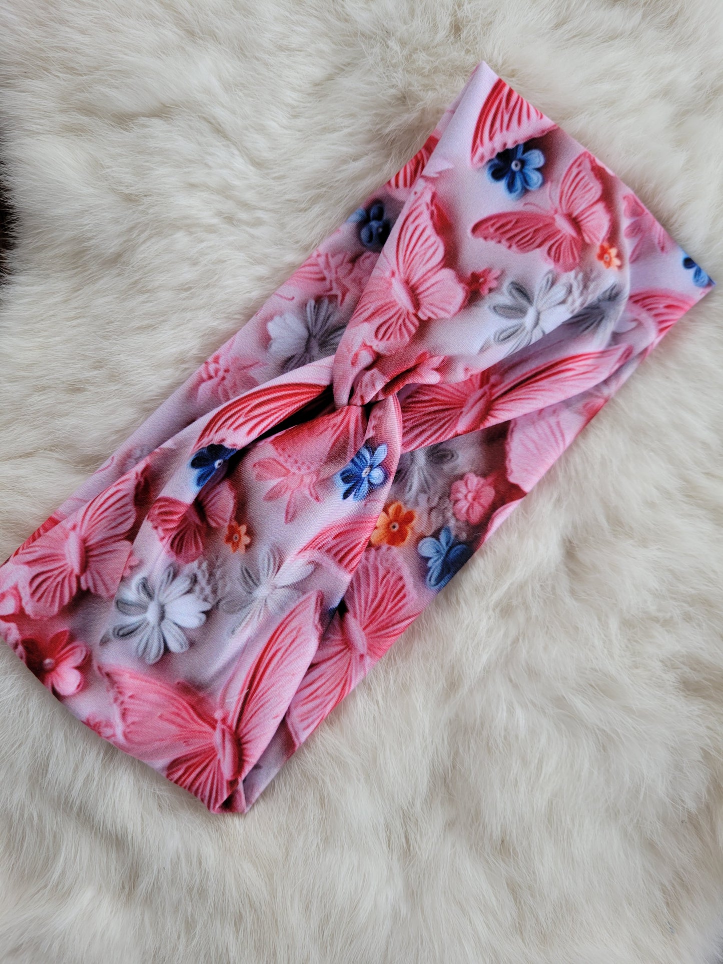 Pink butterflies with blue flowers