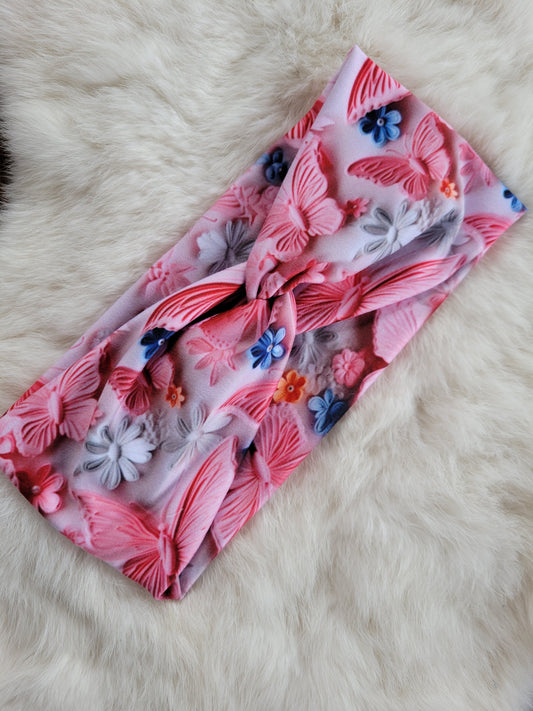 Pink butterflies with blue flowers