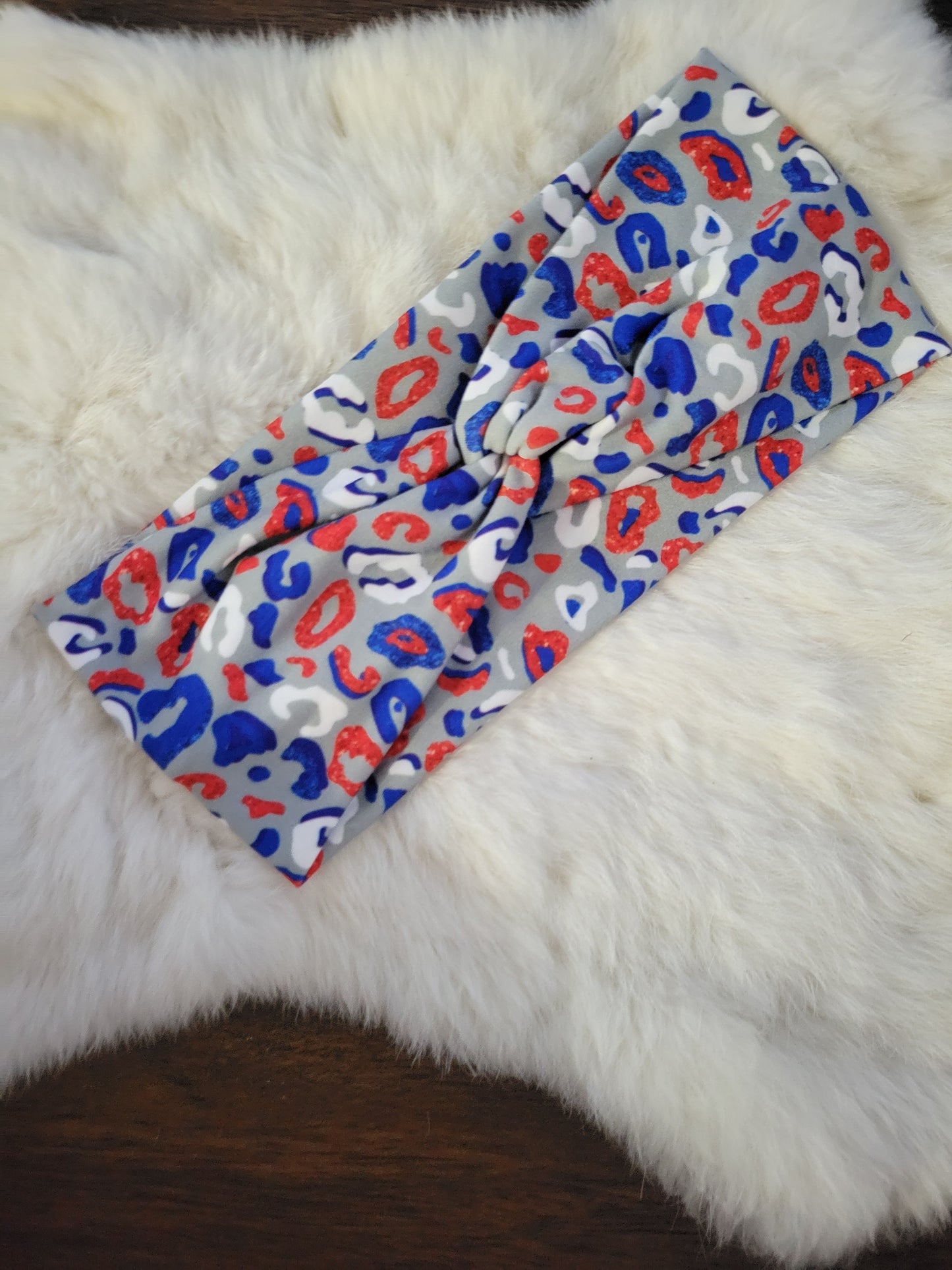 Gray with red white and blue leopard
