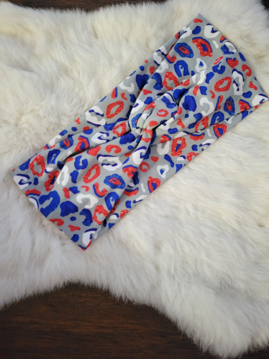 Gray with red white and blue leopard