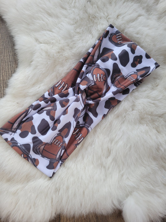 Brown heart footballs with leopard background