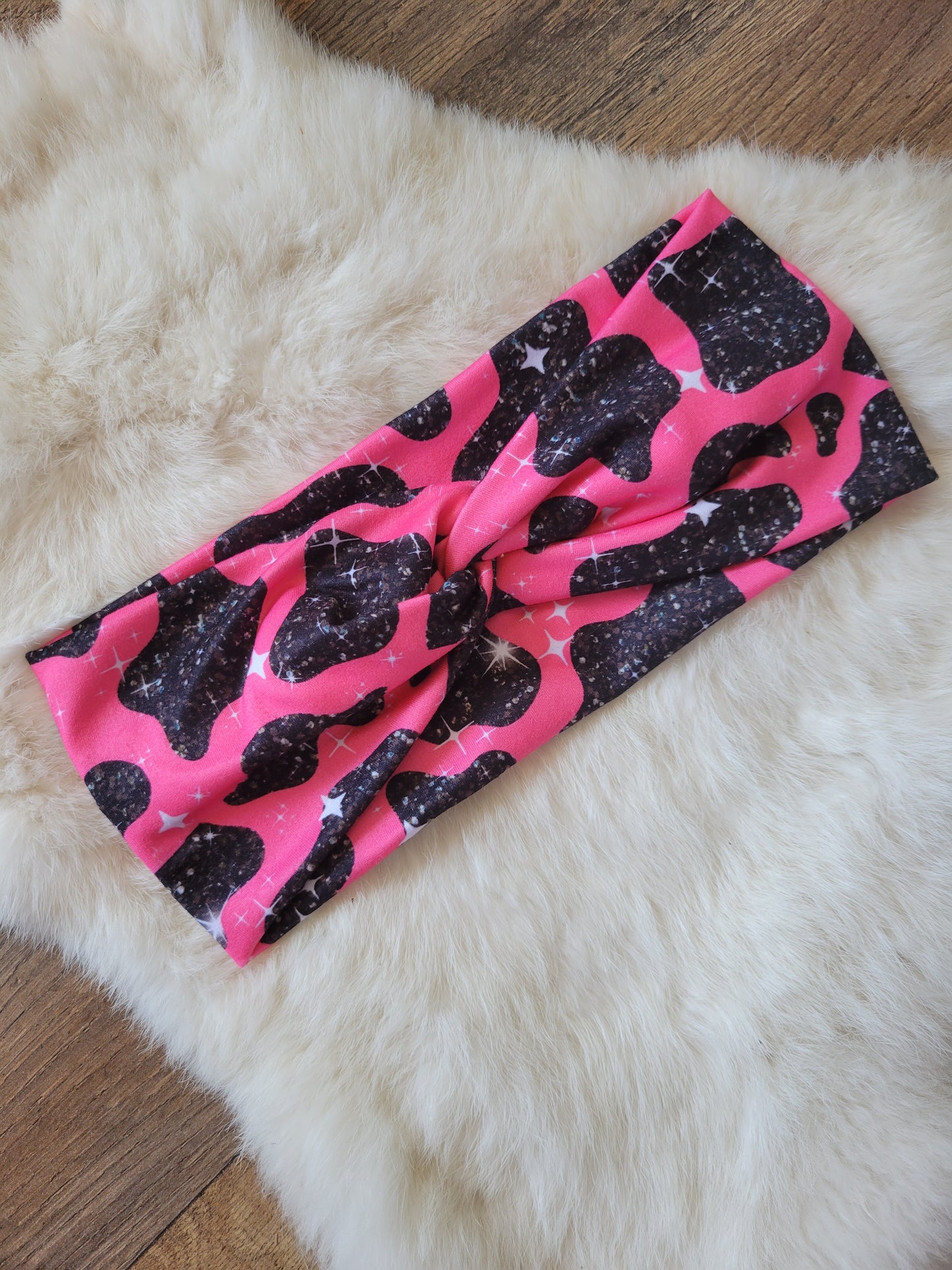 Neon pink with black sparkle cow print