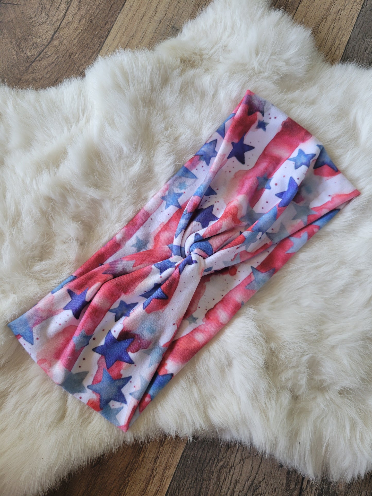 Faded red striped with blue stars