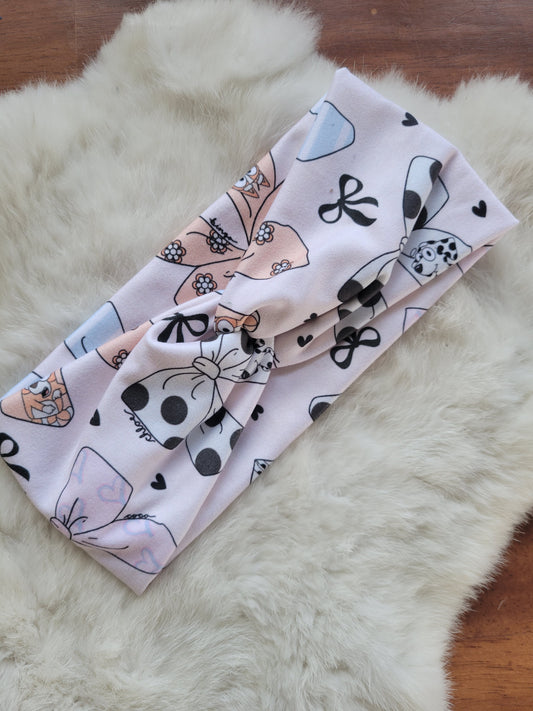 Blue dog character bows