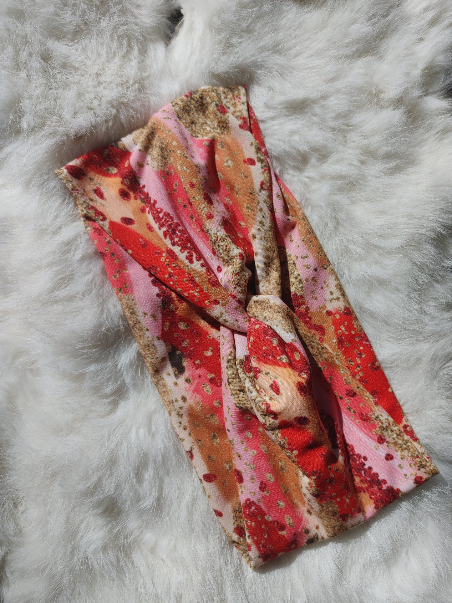 Red/gold brushstroke
