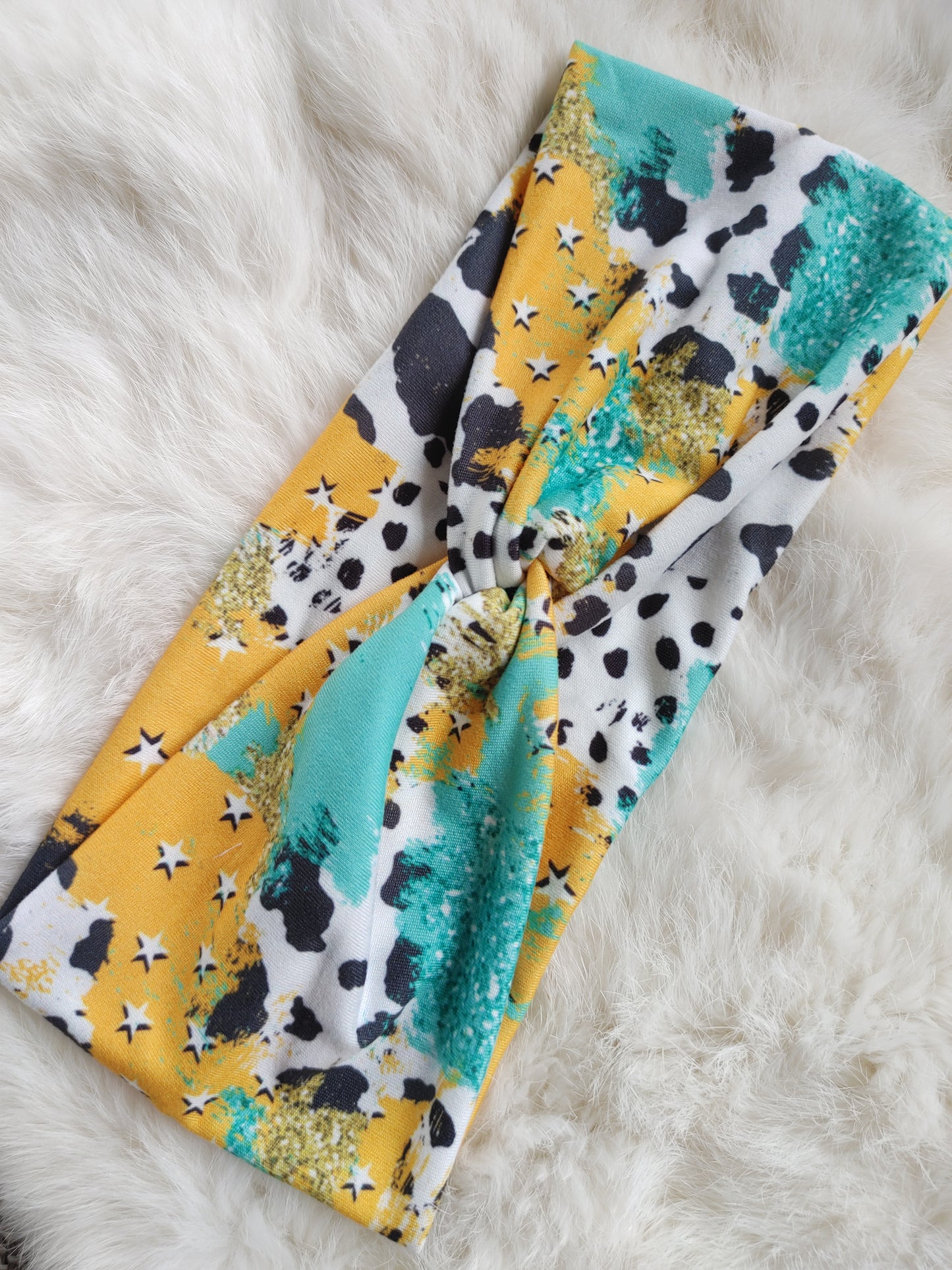 Turquoise and gold cow